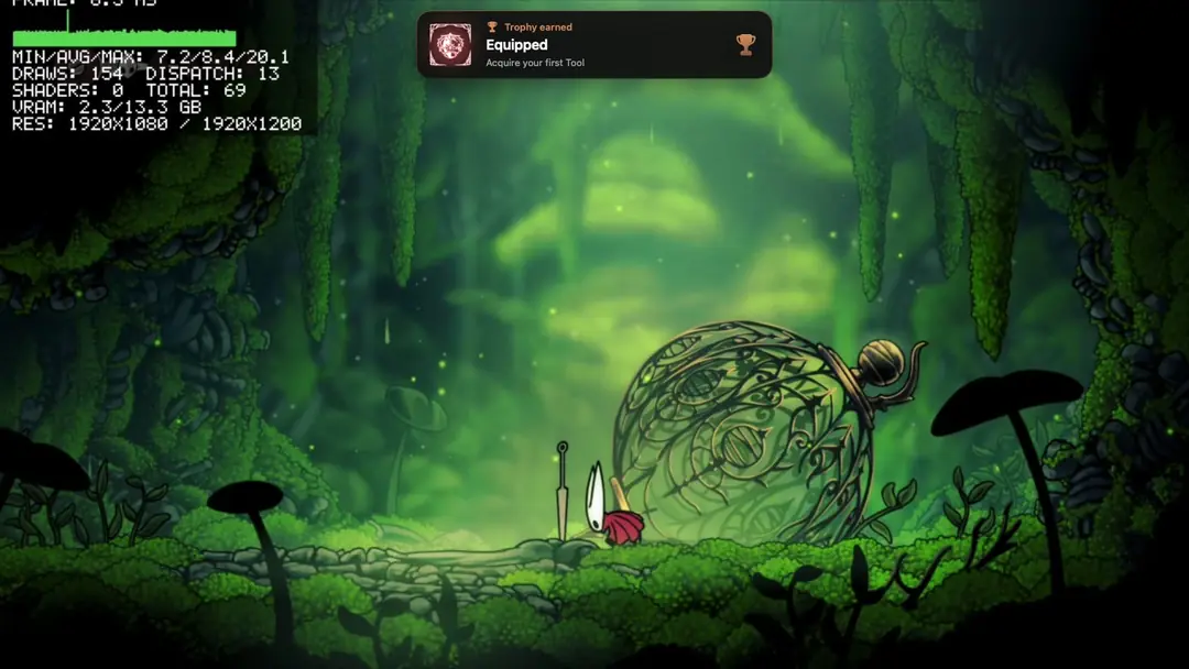 A trophy card dropping in over Silksong while it plays